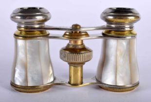 A Cased Antique Pair of Mother of Pearl Opera Glasses. 10cm x 4cm
