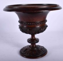 A FINE EARLY VICTORIAN TREEN CARVED WOOD PEDESTAL VASE overlaid with acanthus. 15 cm x 15 cm.