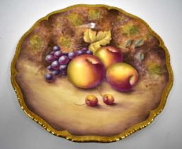 Royal Worcester fruit painted plate with gilt gadrooned rim, painted by Harry Ayrton, signed, with