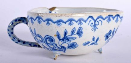 AN ANTIQUE DELFT TIN GLAZED CUP painted with windmills. 9 cm x 7 cm.