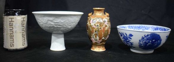 A 19TH CENTURY JAPANESE MEIJI PERIOD SATSUMA VASE together with a Chinese bowl and stem cup. Largest