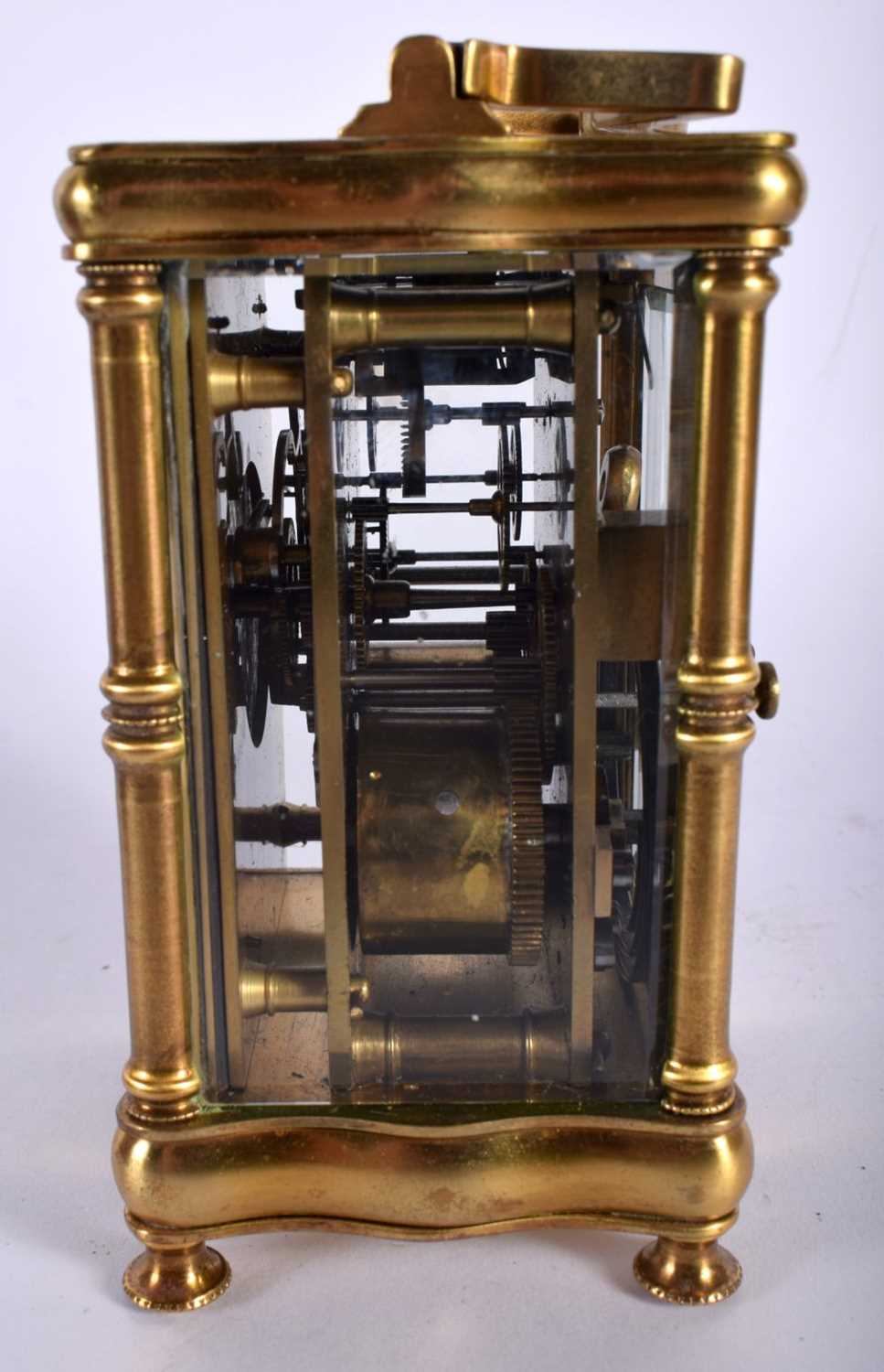 A CASED ANTIQUE BRASS CARRIAGE CLOCK. 14.5 cm high inc handle. - Image 3 of 7