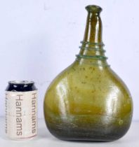 An early green glass flask decorative with a thread glass 28 cm.