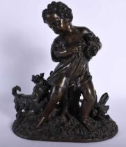 A 19TH CENTURY EUROPEAN BRONZE FIGURE OF A YOUNG BOY modelled holding a puppy with another dog
