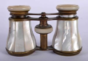 An Antique Pair of Mother of Pearl Opera Glasses. 10cm x 4cm