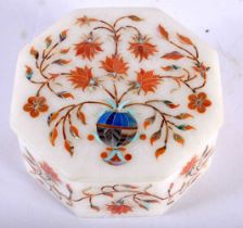 A SMALL INDIAN HARDSTONE INLAID MARBLE BOX AND COVER. 8 cm wide.