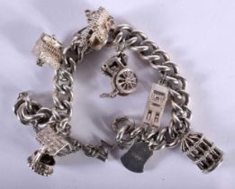 A Silver Charm Bracelet with Eight Charms. 17cm long, weight n66.81g