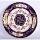 Sevres plate, the border painted in cobalt blue with four oval panels of flowers, the centre with