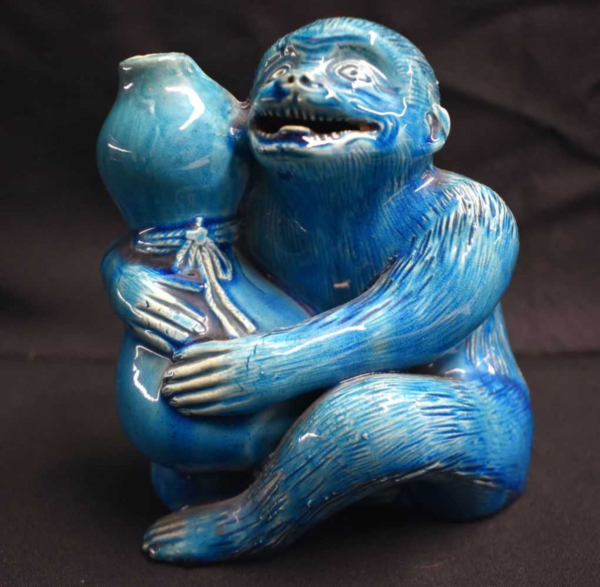 AN UNUSUAL 19TH CENTURY CHINESE BLUE GLAZED PORCELAIN MONKEY GOURD VASE or possibly Burmantofts.