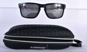A Cased Pair of Oakley Holbrook Glaremaster Sunglasses. 14.2cm wide