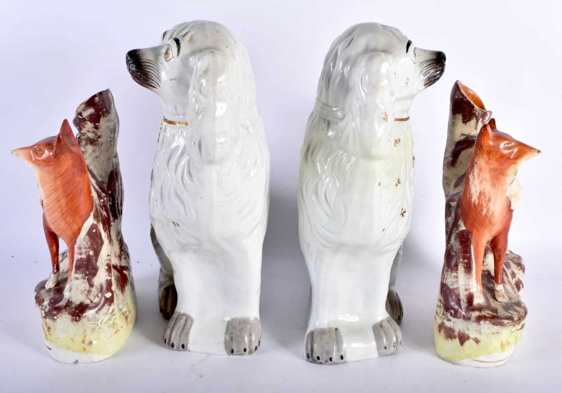 A PAIR OF 19TH CENTURY STAFFORDSHIRE FOXES together with a similar pair of spaniels. Largest 32 cm x - Image 2 of 4