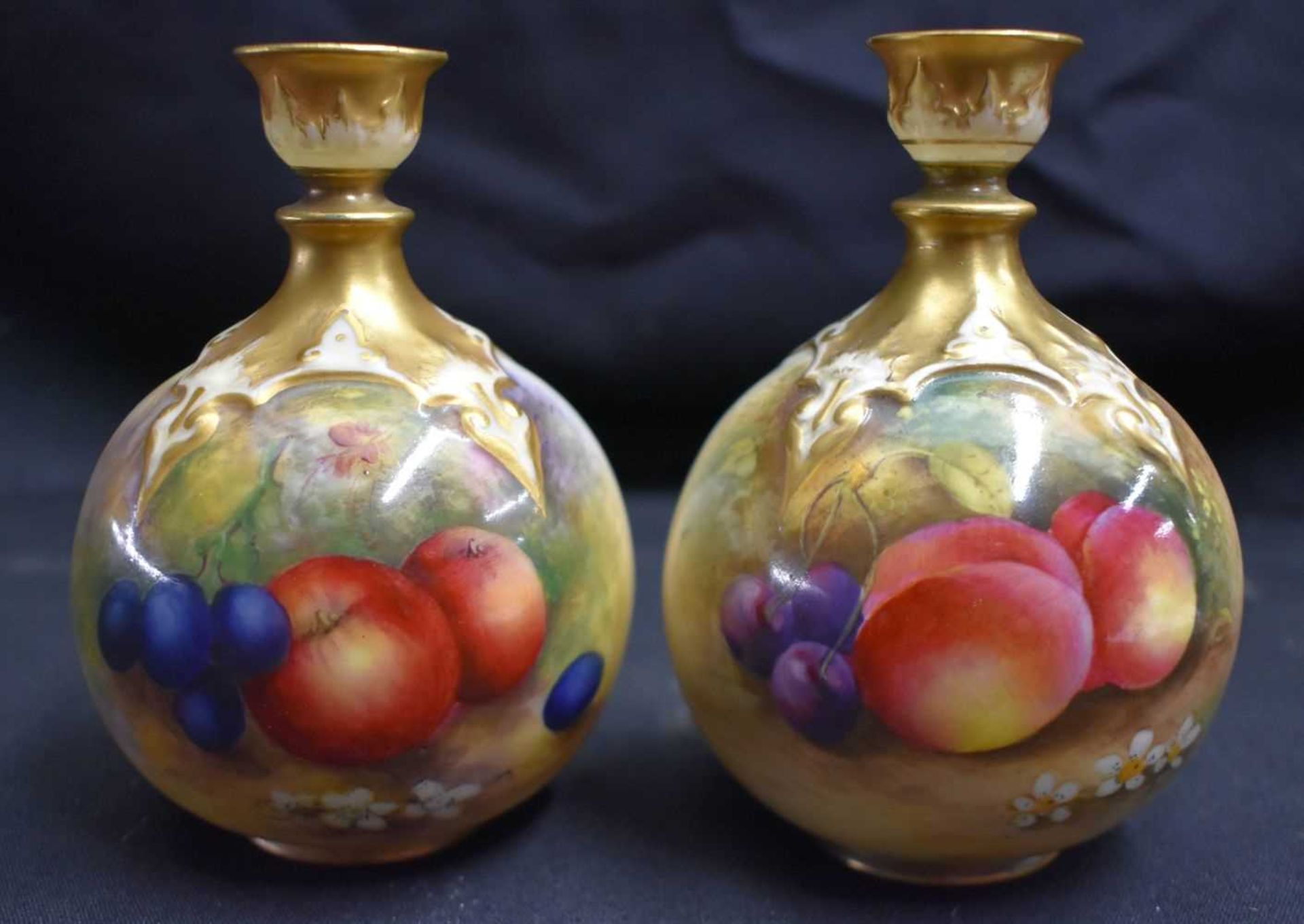 A PAIR OF ROYAL WORCESTER FRUIT PAINTED PORCELAIN VASES by Moseley & Townsend. 13 cm x 8 cm.