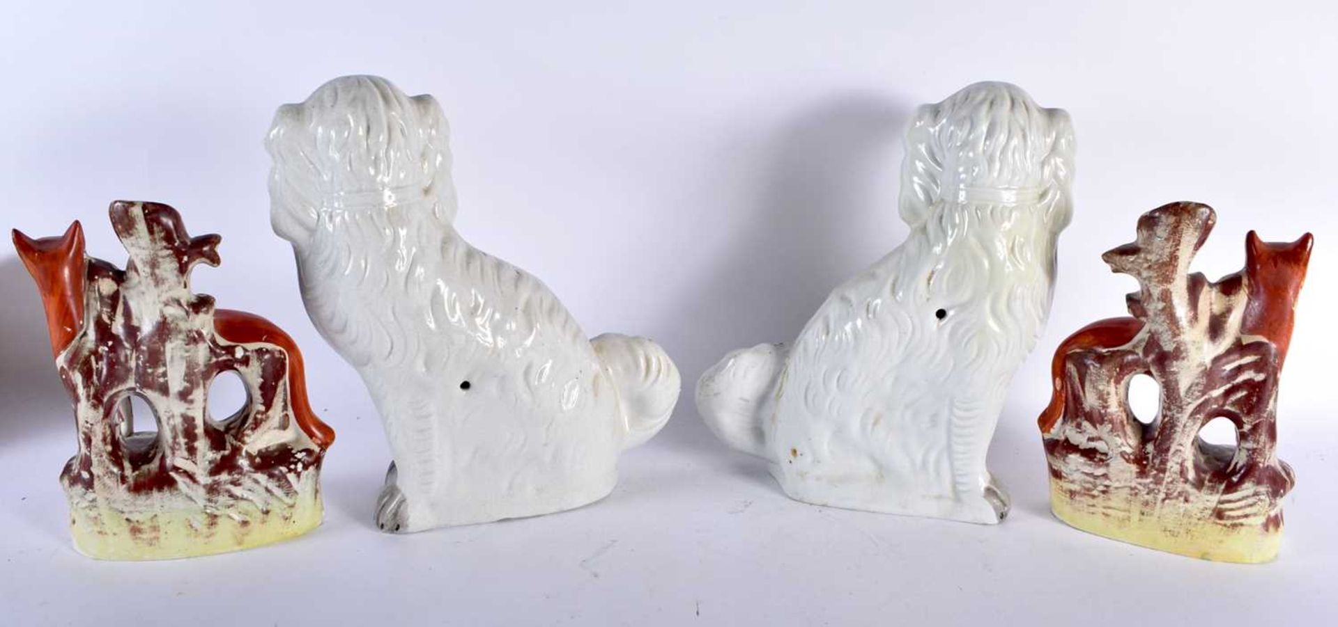 A PAIR OF 19TH CENTURY STAFFORDSHIRE FOXES together with a similar pair of spaniels. Largest 32 cm x - Image 3 of 4