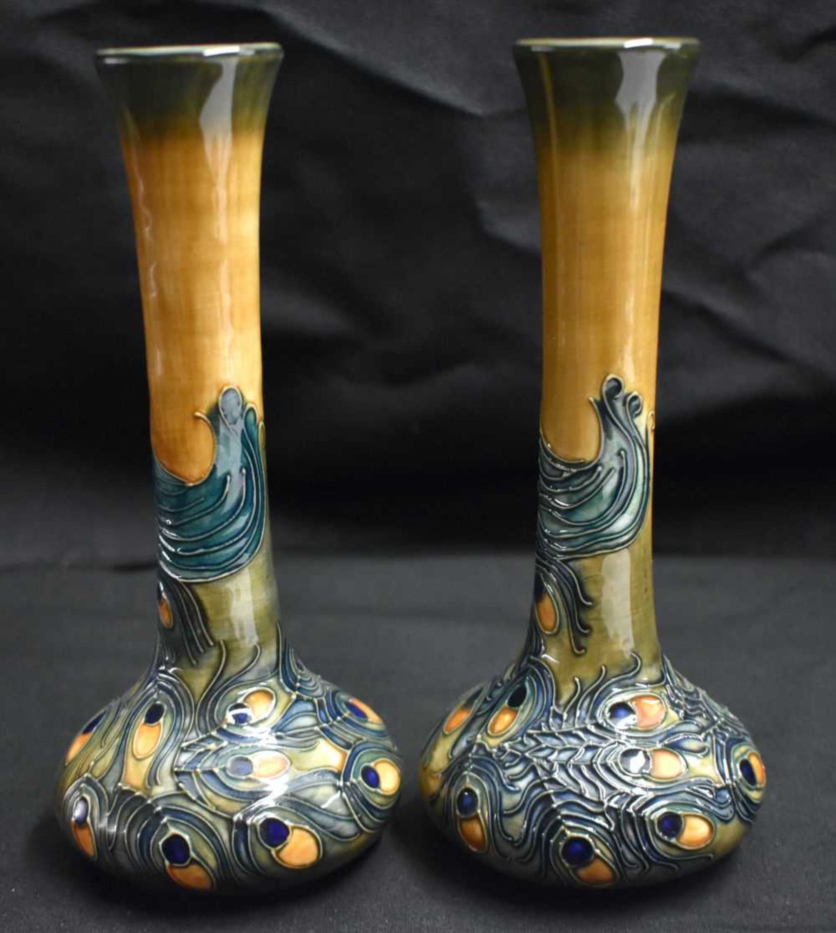 A PAIR OF MOORCROFT PEACOCK FEATHER VASES by Rachel Bishop. 20.5 cm high. - Image 3 of 5