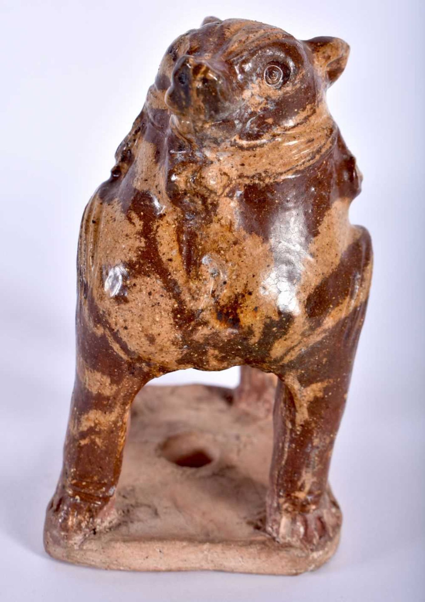 AN EARLY CHINESE MARBLEISED POTTERY BEAST modelled standing upon an unglazed base. 11 cm x 8 cm. - Image 2 of 5