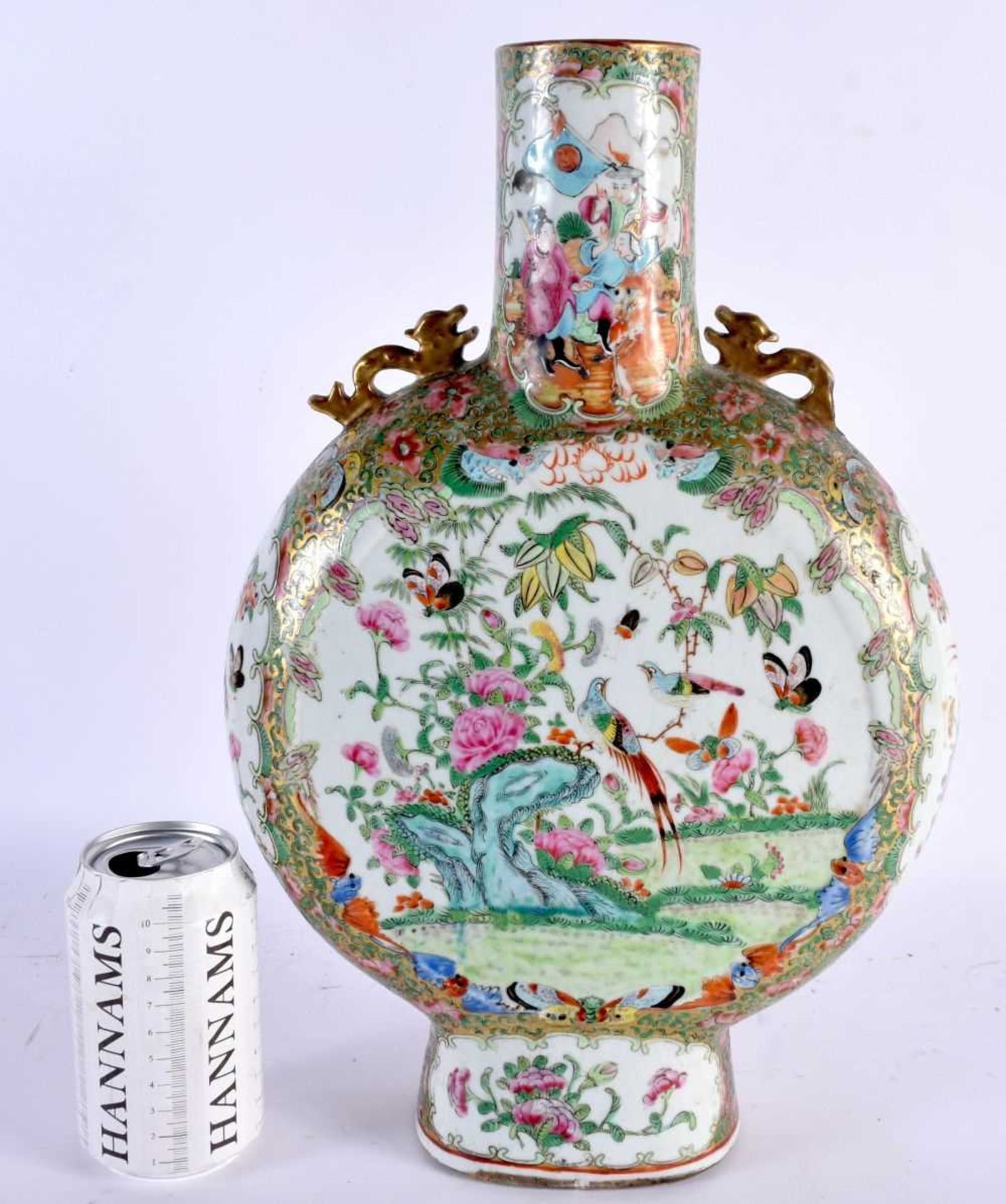 AN UNUSUAL LARGE 19TH CENTURY CHINESE TWIN HANDLED CANTON FAMILLE ROSE MOON FLASK painted with