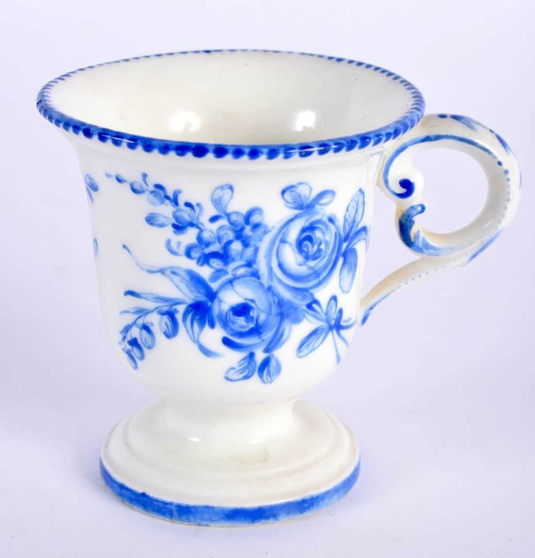 Orleans ice cup painted in dry blue with rose under a blue dentil border, three triangles joined