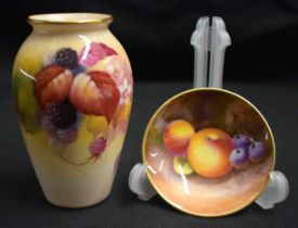 A ROYAL WORCESTER PORCELAIN VASE by Kitty Blake, together with a smaller fruit painted pin dish.