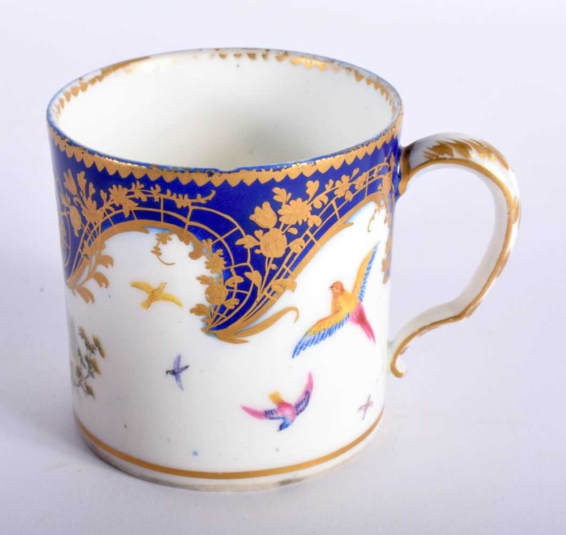 Sevres coffee can painted with two birds in landscape, flying birds and a blue and gilt cornucopia - Image 3 of 5