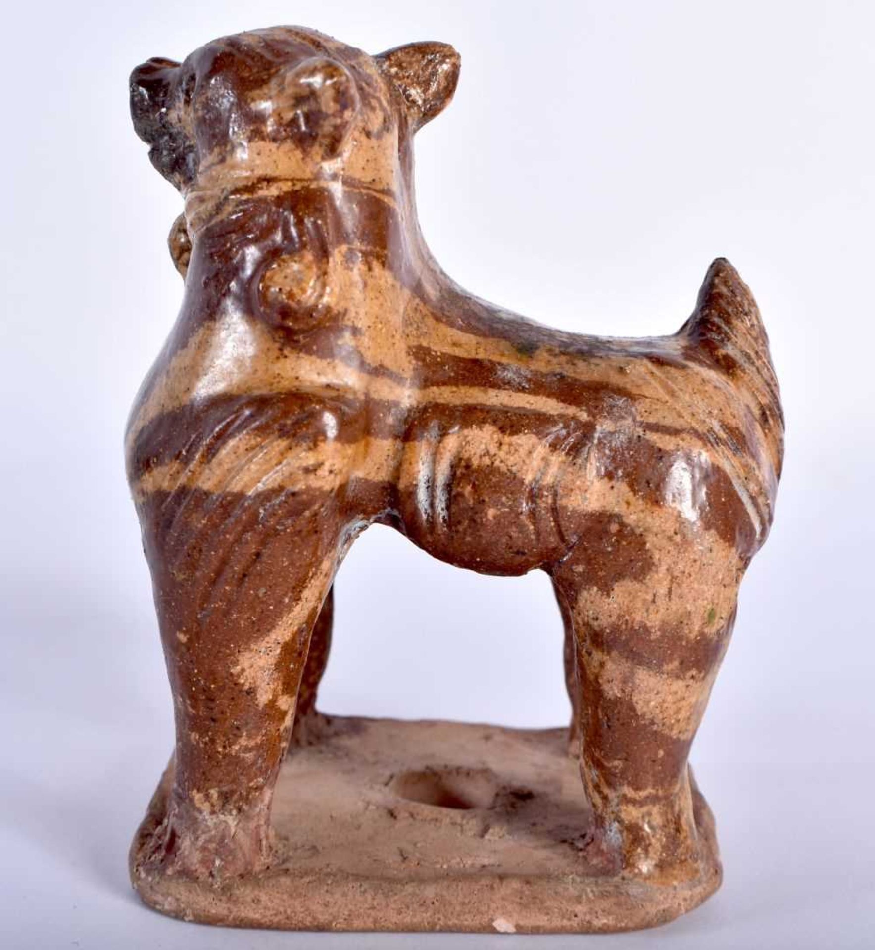 AN EARLY CHINESE MARBLEISED POTTERY BEAST modelled standing upon an unglazed base. 11 cm x 8 cm. - Image 3 of 5