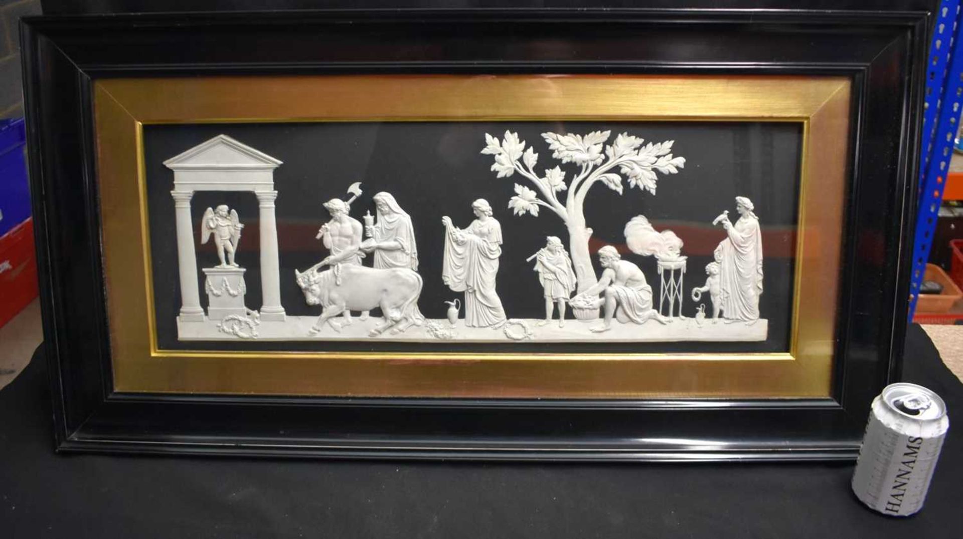 A RARE AND LARGE 19TH CENTURY WEDGWOOD BLACK BASALT PLAQUE depicting classical scenes of figures