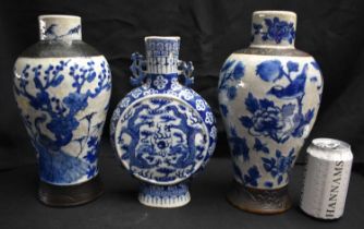 A LARGE PAIR OF 19TH CENTURY CHINESE BLUE AND WHITE PORCELAIN VASES Qing, together with a 19th