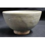 AN EARLY CHINESE CELADON LONGQUAN STONEWARE BOWL Yuan/Ming, of plain elegant form. 12 cm x 8 cm.