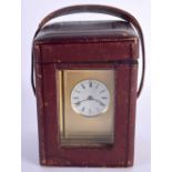 AN ANTIQUE LEATHER CASED REPEATING CARRIAGE CLOCK. 16.5 cm high inc handle.