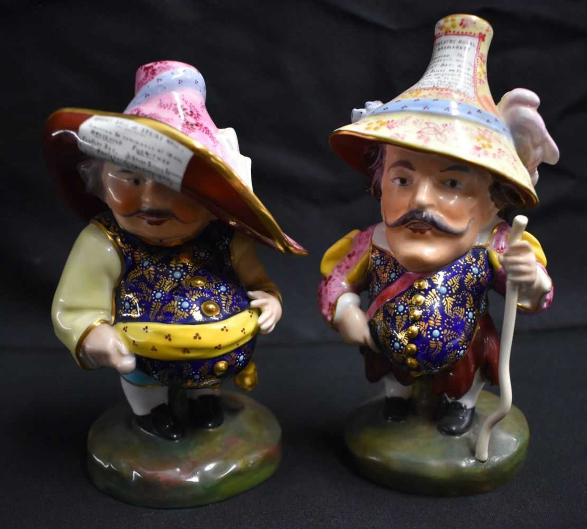 A PAIR OF ROYAL CROWN DERBY MANSIONS DWARFS. 17 cm high.