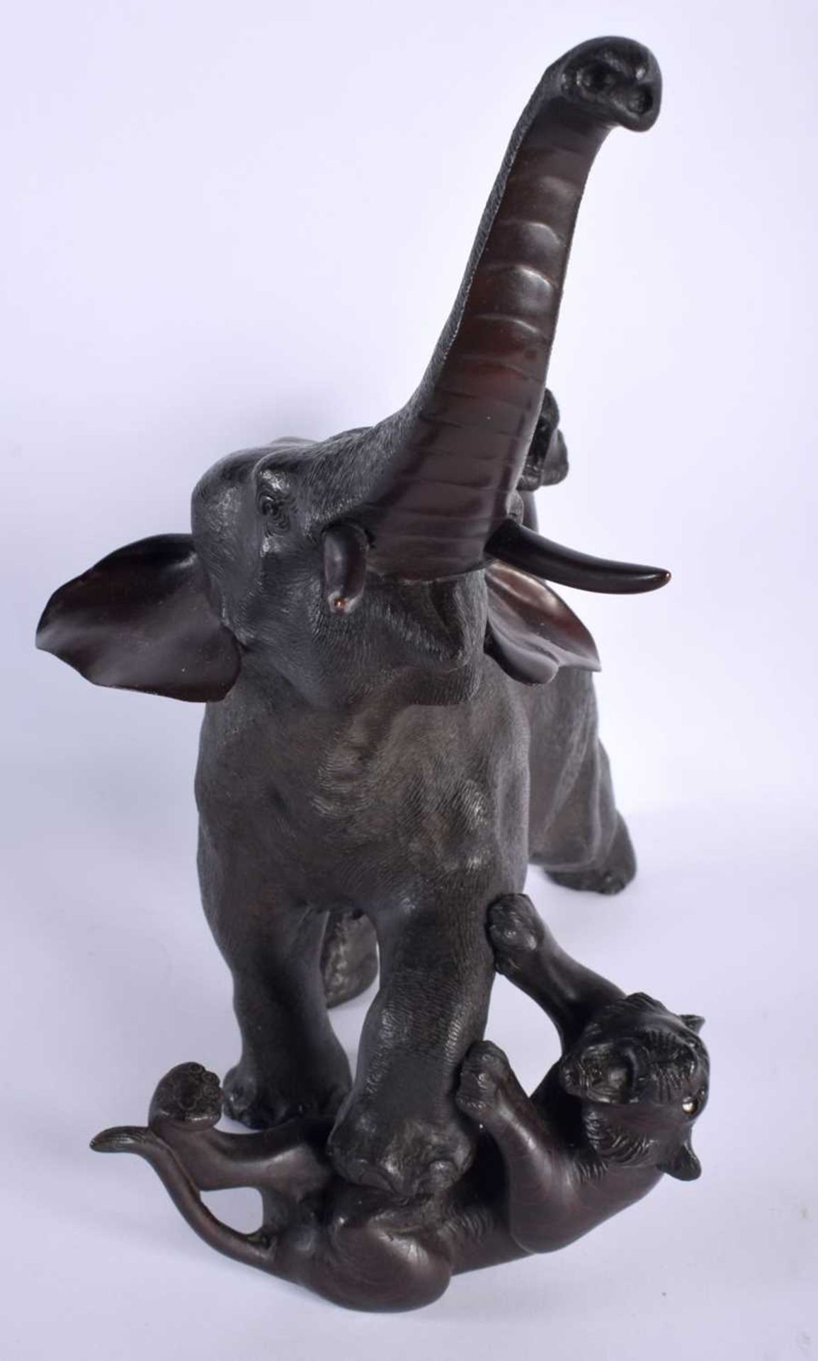 A LARGE 19TH CENTURY JAPANESE MEIJI PERIOD BRONZE OKIMONO modelled as an elephant and tiger upon a - Image 7 of 9