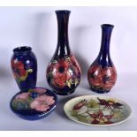 THREE LARGE MOORCROFT VASES together with a bowl & cover & dish. Largest 32 cm high. (5)