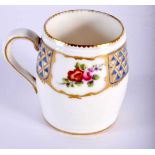 Sevres rare barrel shaped mug painted with alternating floral panels and blue and gilt panels,