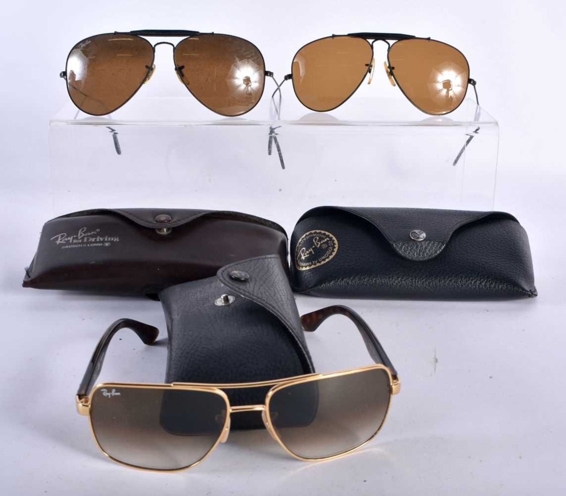 Three pairs of Ray Ban Sunglasses with cases. (3)