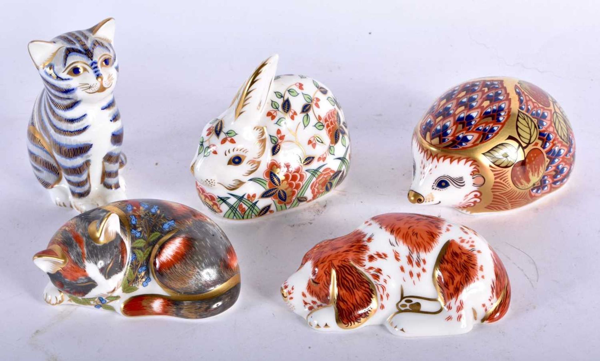 FIVE ROYAL CROWN DERBY IMARI PAPERWEIGHTS including a cat, hedgehog etc. Largest 7 cm wide. (5)