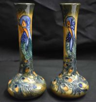 A PAIR OF MOORCROFT PEACOCK FEATHER VASES by Rachel Bishop. 20.5 cm high.