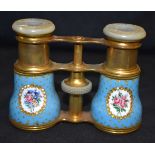 A PAIR OF 19TH CENTURY FRENCH ENAMEL AND MOTHER OF PEARL OPERA GLASSES painted with flowers. 11 cm x