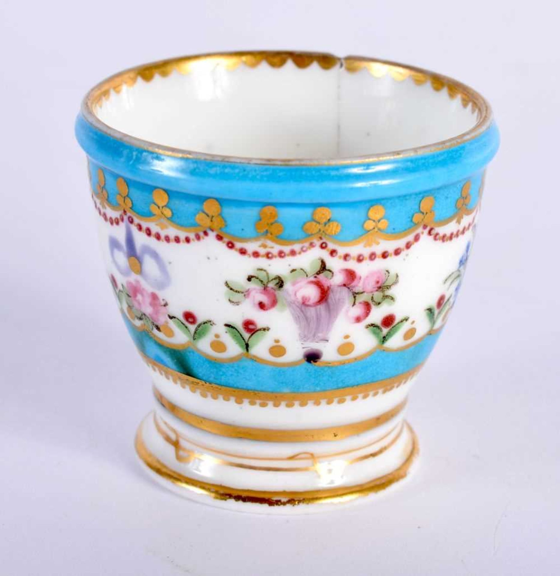 Sevres rare egg cup with turquoise ground the white panel painted with flowers and ribbons, blue L’s
