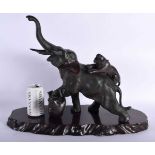 A LARGE 19TH CENTURY JAPANESE MEIJI PERIOD BRONZE OKIMONO modelled as an elephant and tiger upon a