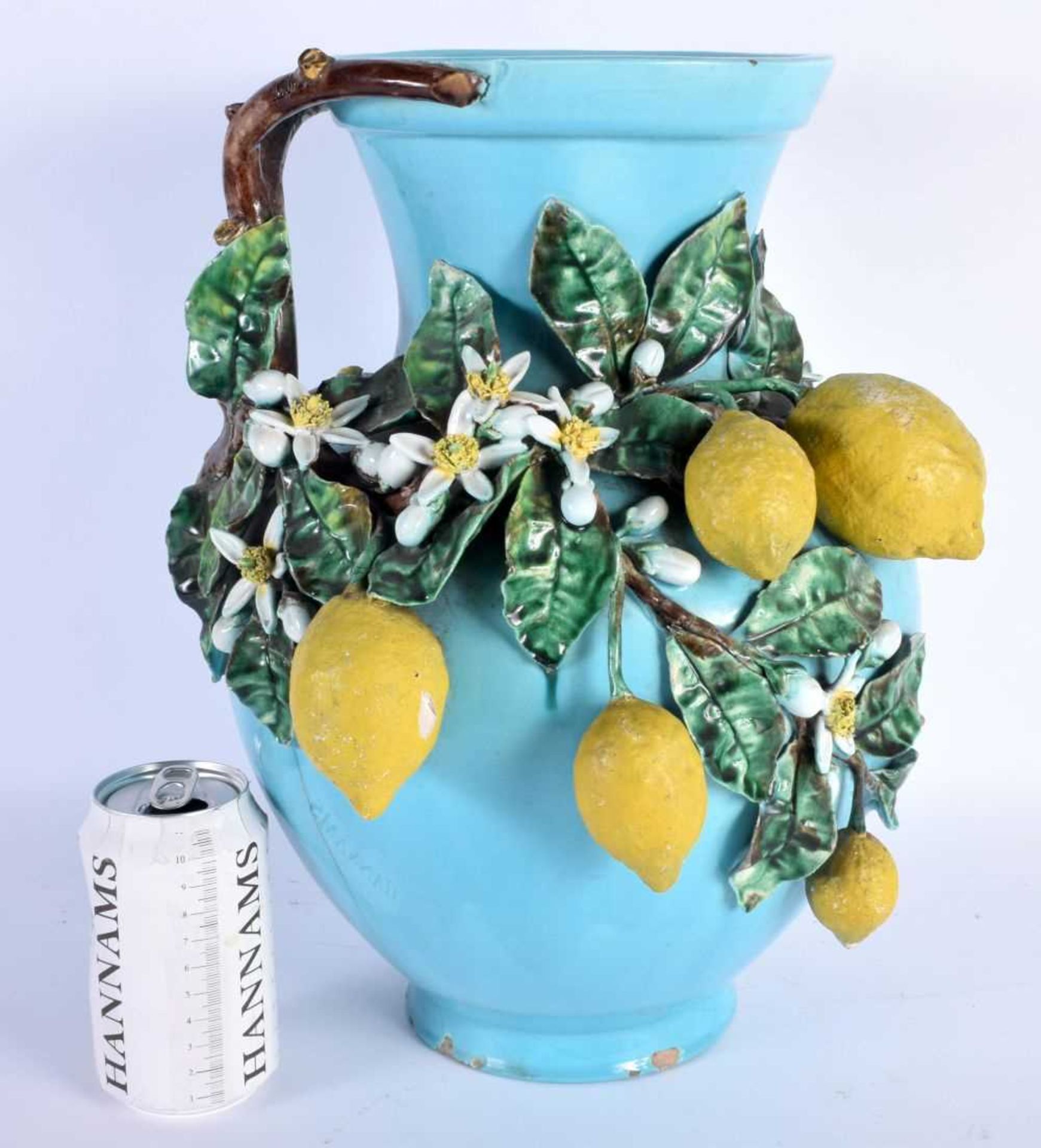 A LARGE EARLY 20TH CENTURY ITALIAN BLUE GLAZED POTTERY MAJOLICA VASE overlaid with fruiting vines.