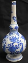 A 17TH CENTURY CHINESE BLUE AND WHITE PORCELAIN ROSE WATER SPRINKLER Kangxi, painted with floral