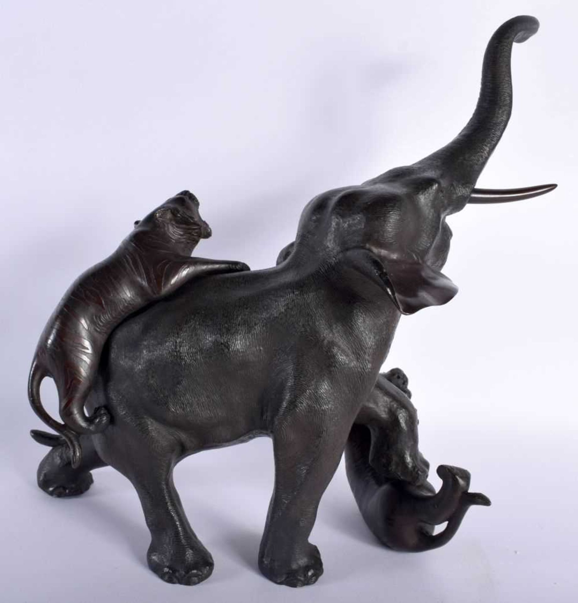 A LARGE 19TH CENTURY JAPANESE MEIJI PERIOD BRONZE OKIMONO modelled as an elephant and tiger upon a - Image 6 of 9