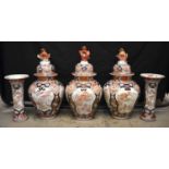 A FINE SET OF VERY LARGE 18TH CENTURY JAPANESE EDO PERIOD IMARI VASES AND COVERS painted with panels