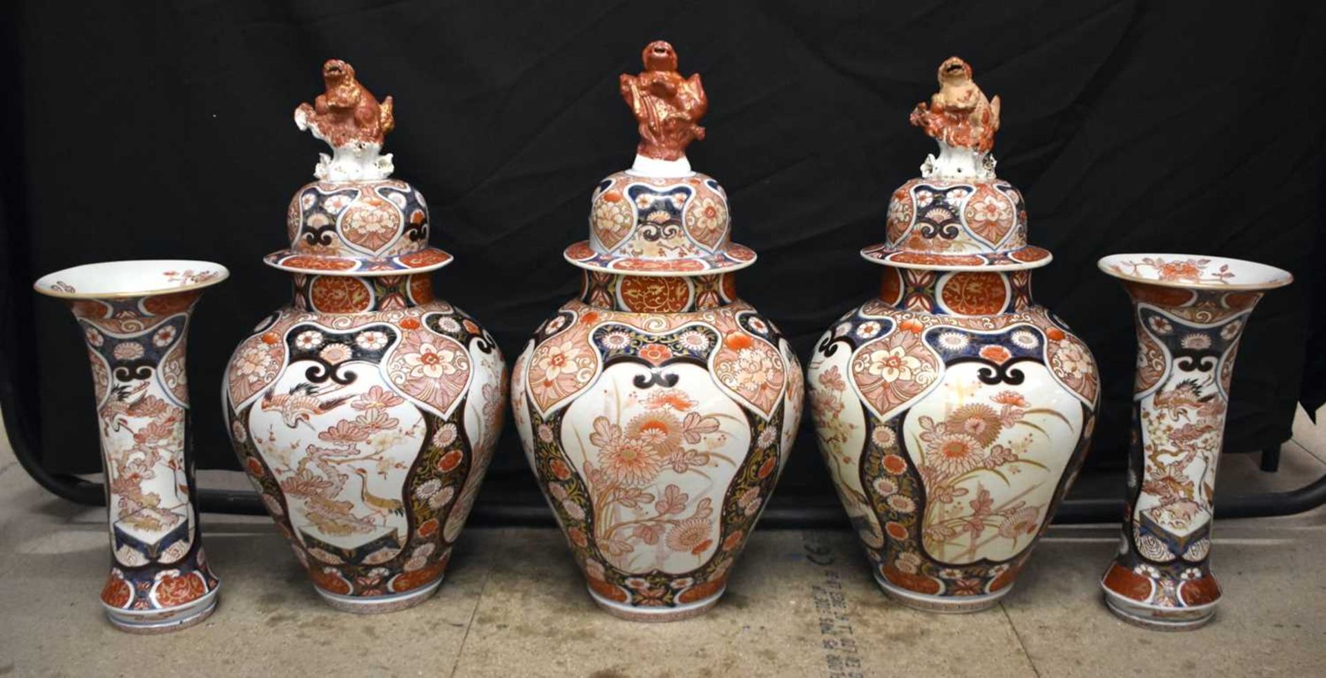 A FINE SET OF VERY LARGE 18TH CENTURY JAPANESE EDO PERIOD IMARI VASES AND COVERS painted with panels