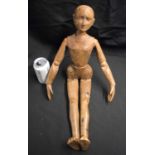 A CHARMING 19TH CENTURY EUROPEAN CARVED PINE ARTISTS LAY DOLL of plain form with elongated arms.