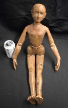 A CHARMING 19TH CENTURY EUROPEAN CARVED PINE ARTISTS LAY DOLL of plain form with elongated arms.