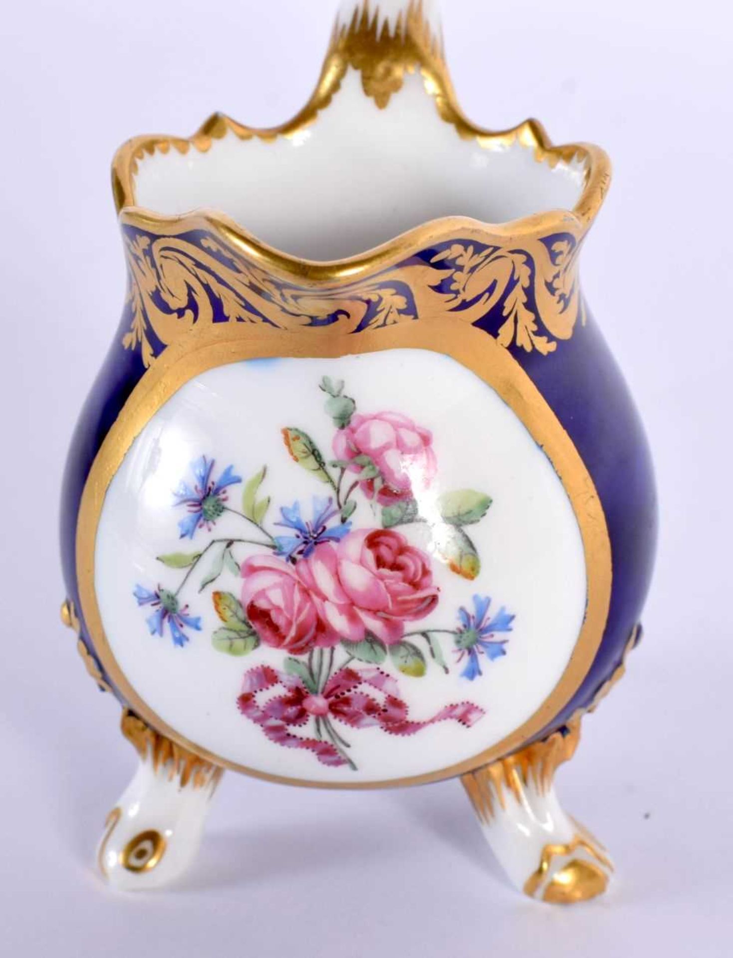 Sevres cream jug on three feet painted with flowers in a tear-drop panel, the cobalt blue ground - Image 4 of 4