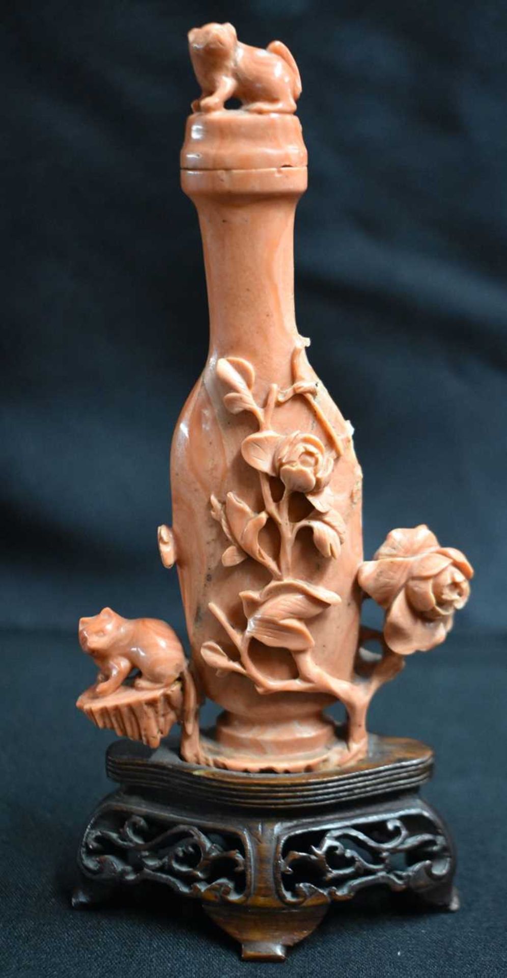 A LATE 19TH CENTURY CHINESE CARVED CORAL VASE AND COVER Qing, formed as a cat beside an overlaid
