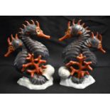 A PAIR OF HEREND HUNGARIAN PORCELAIN SEA HORSES. 18 cm x 9 cm.