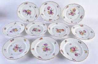 A SET OF TEN DANISH ROYAL COPENHAGEN PORCELAIN SCALLOPED DISHES painted with flowers. 21 cm wide. (