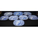 A collection of Antique Willow pattern meat platters 43 x 32 cm(8).
